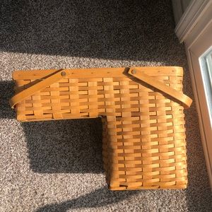 Longaberger Step it up stair basket with plastic liner.
